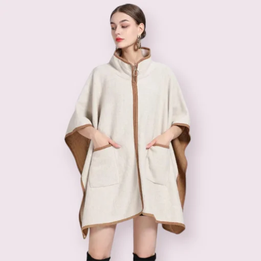 Poncho veste femme crème élégant avec col haut et poches, parfait pour lautomne.