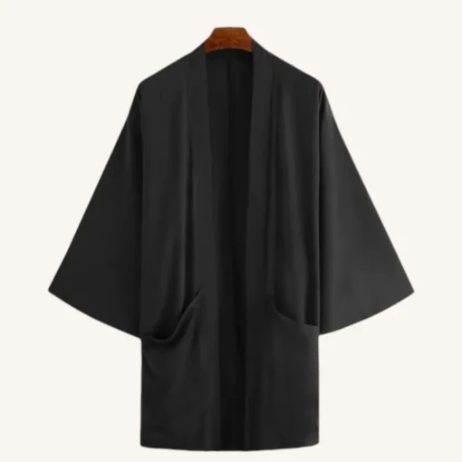 Robe noire élégante et minimaliste avec poches, parfaite pour le confort et le style au quotidien.