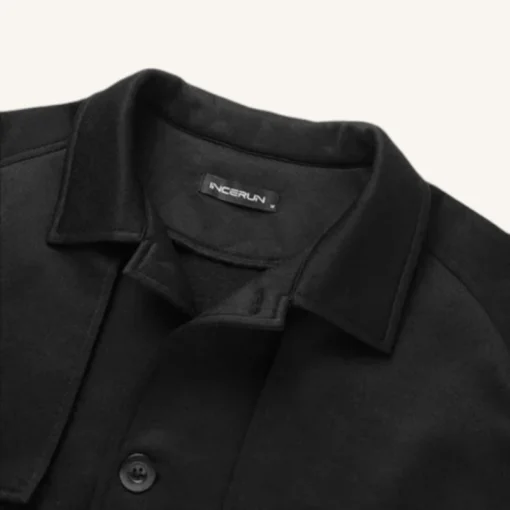 Chemise noire chic avec col moderne et étiquette INCERUN, idéal pour toutes occasions.