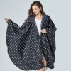 Cape de Pluie Femme Noire à Pois Blancs